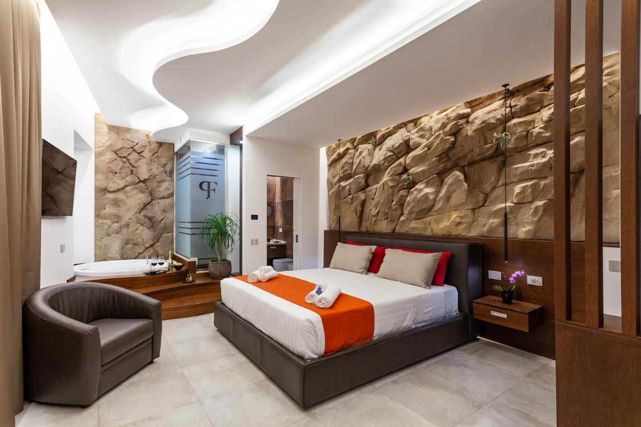 Palazzo Ferrucci Luxury Suites กาญารี ภายนอก รูปภาพ