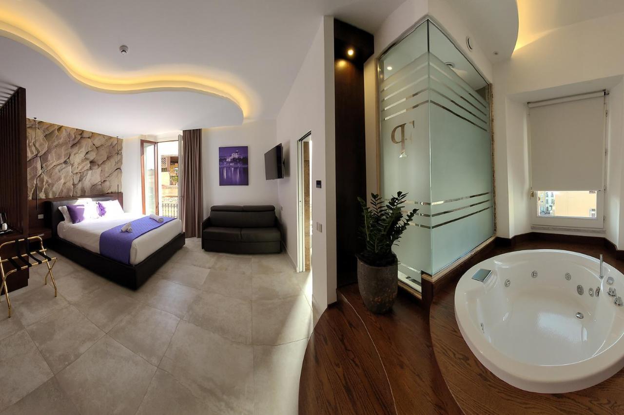 Palazzo Ferrucci Luxury Suites กาญารี ภายนอก รูปภาพ